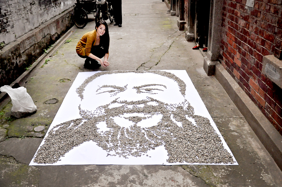 Red Hong Yi Red created a portrait of Chinese artist Ai Weiwei in the alleyway next to her home in Shanghai.